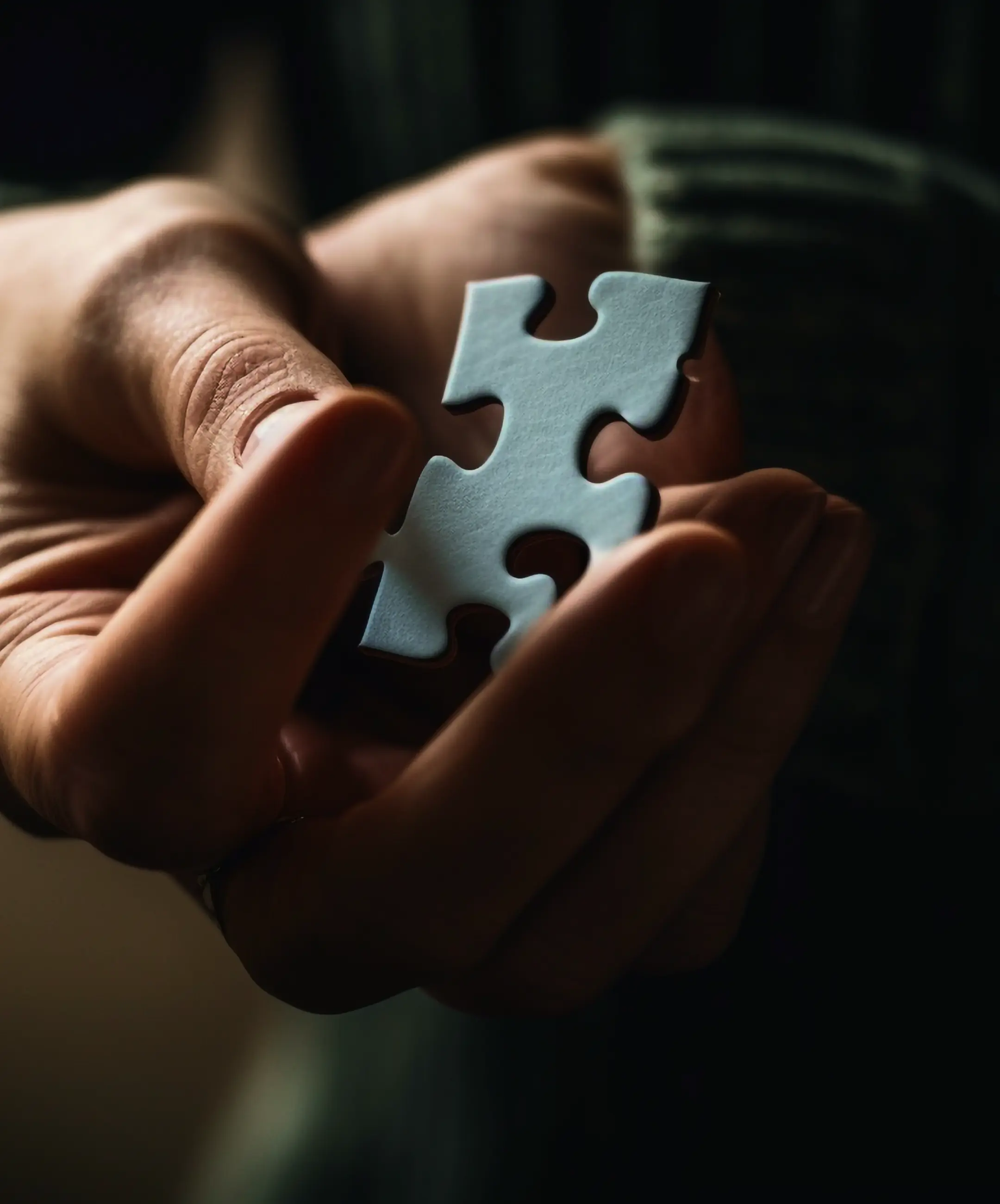 Person holding jigsaw puzzle solution success generated