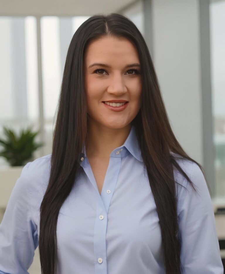 Chesney Reeves, paralegal at Nocturnal Legal, in professional attire